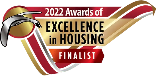 2022 Excellence in Housing Award finalist badge, emphasizing quality and recognition in housing projects.